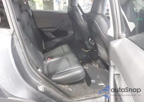 2023 Tesla Model Y Awd/Long Range Dual Motor All-Wheel Drive z USA, uszkodzony, nr VIN 7SAYGDEE4PA074009